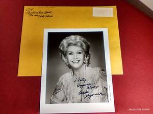lot 65 image: Autographed 1990s Photo of Debbie Reynolds