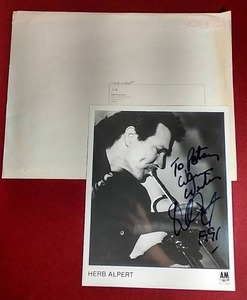 lot 87 image: Autographed 1990s Photo of Herb Alpert