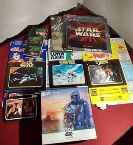 lot 98 image: Star Wars Lot - Thomas Kinkade Puzzle, Lenticular Cereal Boxes, Etc