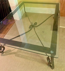 Glass Topped Coffee Table with Decorative Metal Frame