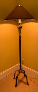 Maitland Smith Elegant Floor Lamp. Bronze and iron leg, leather shade, gold embossed.