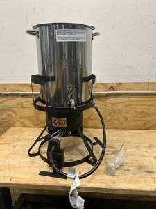 lot 84 image: BASS PRO SHOPS Stainless Steel Turkey Fryer with Spigot- 30 Quart