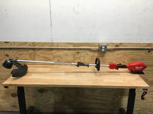 lot 112 image: Milwaukee Power Head Weed Whip Model # 2825-20 (Tool Only)