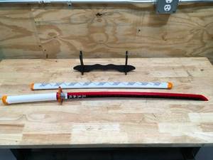 lot 164 image: Toy Katana And Stand