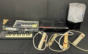 lot 93 image: Lot of Electronic Items LG VCR, Casio SK-1 Keyboard, and More
