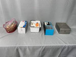 lot 32 image: Assorted Household Items Including LED Bulbs, Basket, and Storage Boxes