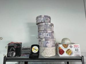 lot 49 image: Assorted Household Items with Storage Boxes, Audio Equipment, and More