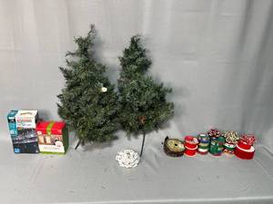 lot 92 image: Holiday Decor Lot Artificial Christmas Trees, Lights, Ribbons, and Bows