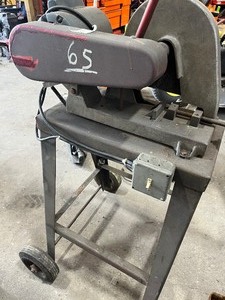 lot 74 image: cut off saw on rolling stand