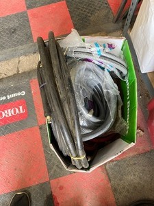 lot 51 image: box of hose material