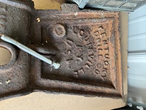 lot 49 image: outside lights small tire and wheel  and cast bracket