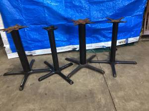 lot 48 image: FOUR METAL TABLE STANDS HOME USE OR BUSINESS