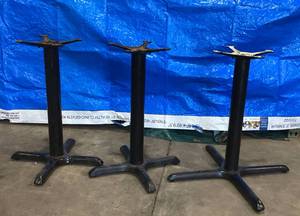 lot 47 image: THREE METAL TABLE STANDS HOME USE OR BUSINESS