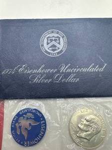 lot 9 image: 1974-S Blue Ike Dollar