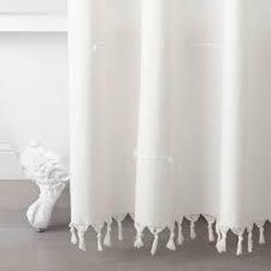 lot 121 image: Hearth & hand with Magnolia Knotted Fringe Shower Curtain Sour Cream