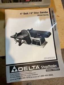 lot 162 image: Delta Four Inch Belt and Six Inch Disc Sander with Stand Model SA446