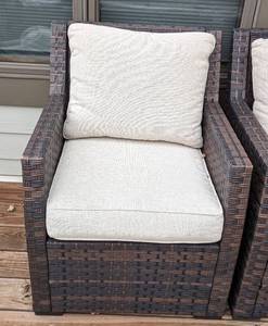 lot 12 image: Three Ashley Furniture Brook Ranch Patio Armchairs