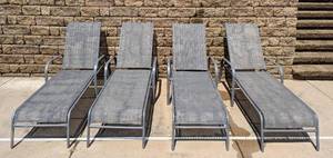 lot 40 image: Four Grey Patio Lounge Chairs