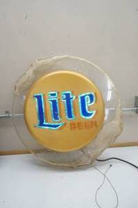 lot 335 image: Miller Lite beer sign, lighted, some repair