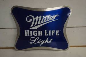 lot 556 image: Miller High Life Light Beer Metal Sign