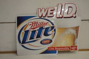 lot 582 image: Miller Lite We I.D.