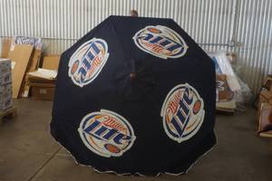 lot 637 image: Miller Lite Patio Umbrella (Wood Pole)