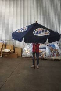 lot 638 image: Miller Lite Patio Umbrella (Wood Pole)