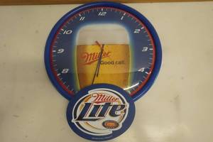 lot 693 image: Miller Lite Clocks