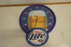 lot 694 image: Miller Lite Clocks