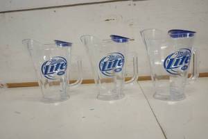 lot 736 image: Miller Lite Pitcher wIce Holder set of 3