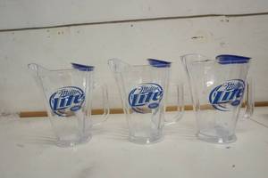 lot 738 image: Miller Lite Pitcher wIce Holder set of 3
