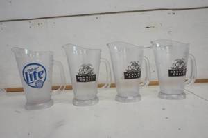lot 739 image: Miller Genuine Draft & Miller Lite Plastic Pitcher set of 4
