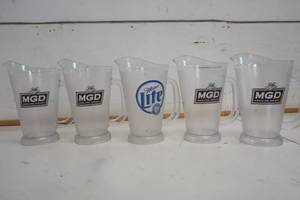 lot 743 image: Miller Genuine & Miller Lite Draft Plastic Pitcher set of 5