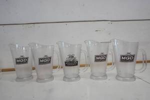 lot 744 image: Miller Genuine Draft Plastic Pitcher set of 5