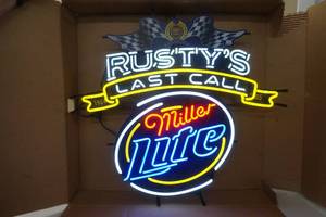 lot 19 image: Rustys Last Call Miller Light Neon Beer Sign 28 x 27