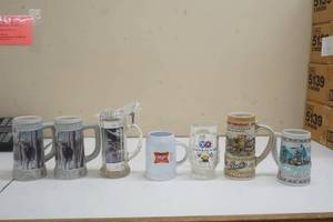 lot 68 image: Variety of Strohs Mugs & Miller Lite Steins