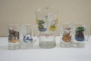 lot 104 image: Series 2 Schmidt Beer Pitcher and four mugs
