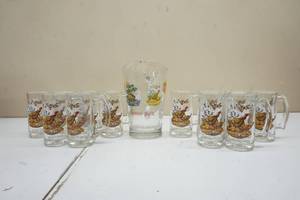 lot 107 image: Series 2 Schmidt Beer Pitcher and twelve mugs