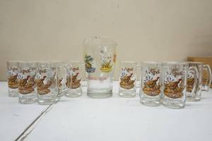 lot 108 image: Series 2 Schmidt Beer Pitcher and twelve mugs