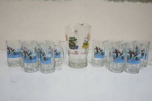 lot 114 image: Series 2 Schmidt Beer Pitcher and twelve mugs