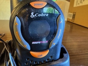 lot 29 image: Cobra Micro Talk Walkie Talkies with Desktop Charger