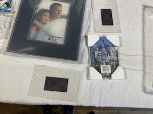 lot 77 image: New Leather Look Photo Book with Various Sized Standing and Magnetic Picture Frames