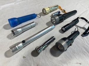 lot 99 image: Eight Flashlights
