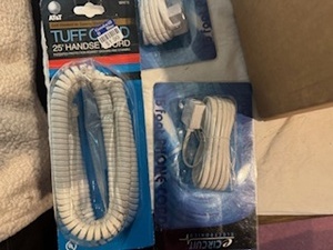 lot 142 image: Phone Cords, Power Strips, Extension Cords