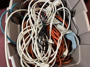 lot 176 image: Tote of Extension Cords, Power Strips and more