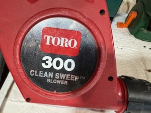 lot 179 image: Toro Electric (corded) 300 Clean Sweep Blower and Pair of Hand Spreaders