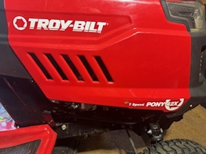 lot 1 image: Troy Bilt Speed Pony 42X Riding Lawn Mower with Bagger Attachment