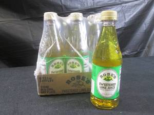 lot 399 image: (B-1) 6 Bottles Roses Sweetened Lime Juice From Concentrate12oz Past Date