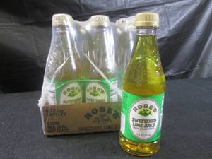 lot 400 image: (B-1) 6 Bottles Roses Sweetened Lime Juice From Concentrate12oz Past Date