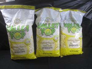 lot 124 image: (EC2) 3 Large Bags of Butter Flavored with Sea Salt Popcorn 16oz Bags Past Date
